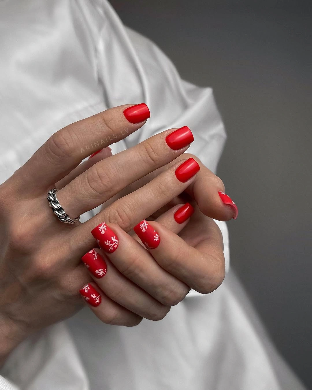 elegant fall mid length nails 2026 Classic Red with Delicate White Art