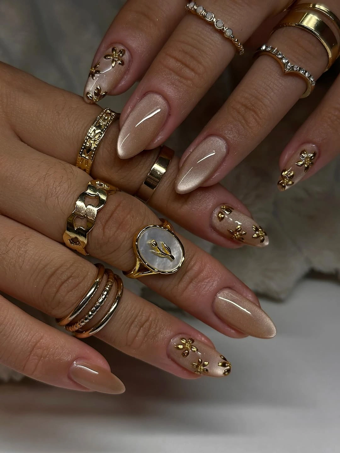 elegant fall short almond nails 2026 Soft Champagne Neutrals with Golden Botanical Accents