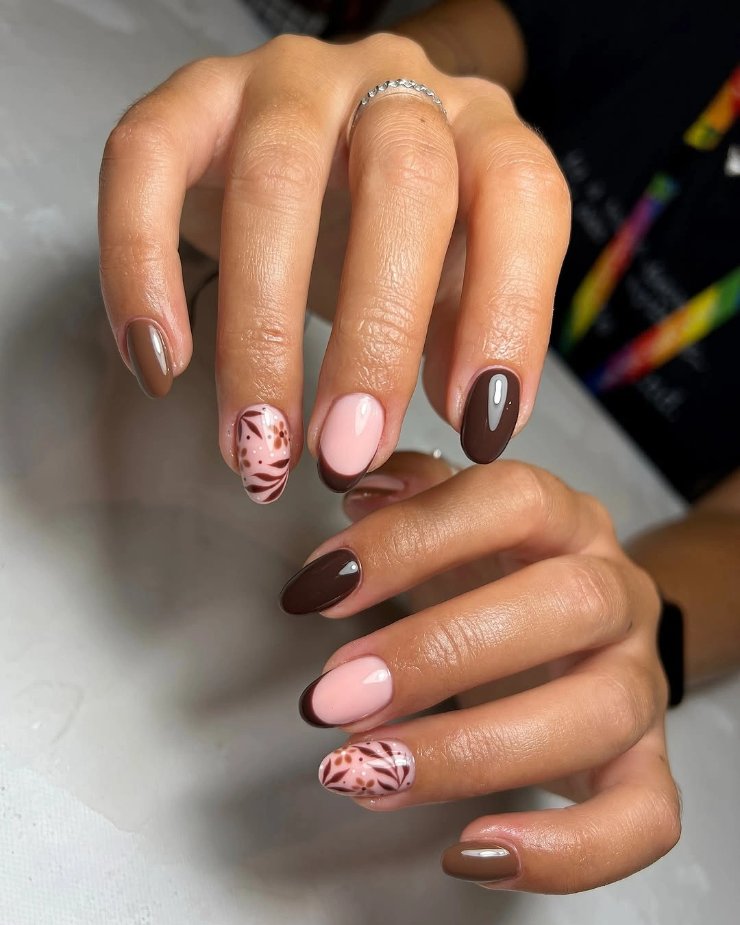 elegant fall short almond nails 2026 Soft Brown French Tips with Botanical Details