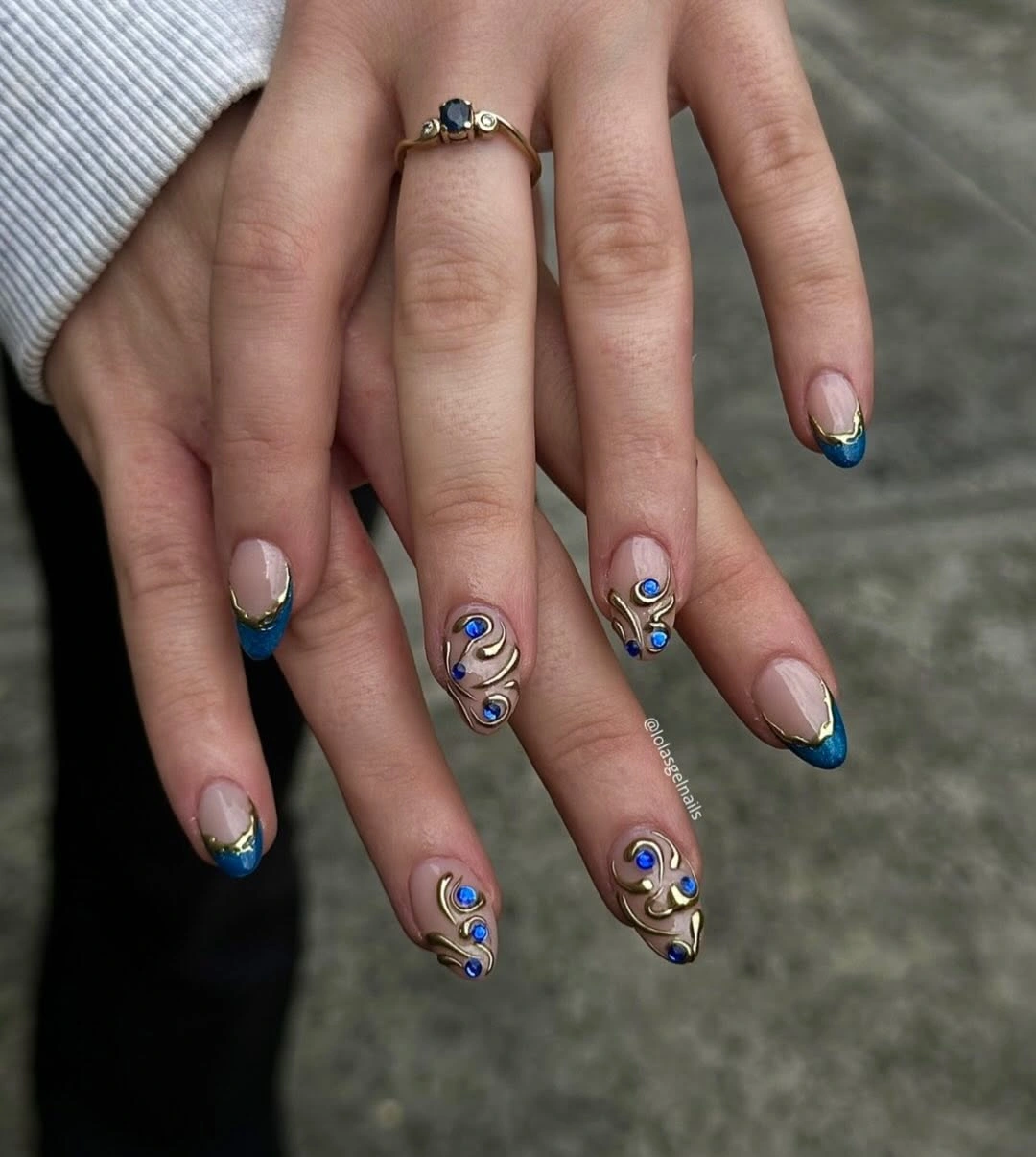 elegant fall short almond nails 2026 Royal Blue French Tips with Gold Details