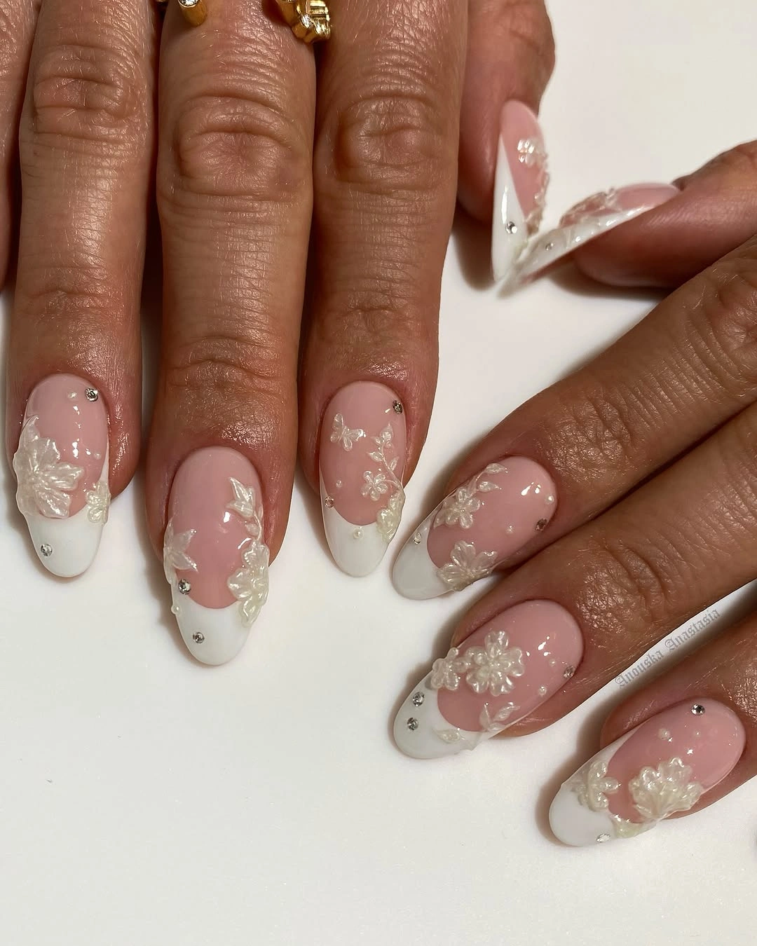 elegant fall wedding nails 2026 Romantic French Tips with Sculpted Floral Details