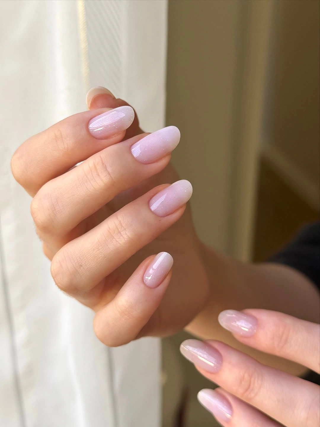 elegant fall wedding nails 2026 Milky Shimmer Almond Nails for a Minimal Bridal Look