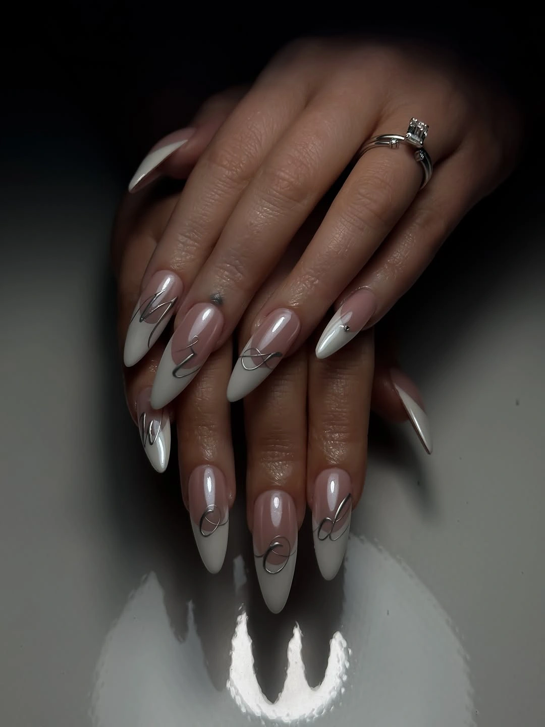 elegant fall wedding nails 2026 Modern French Almond Nails with Silver Ribbon Accents
