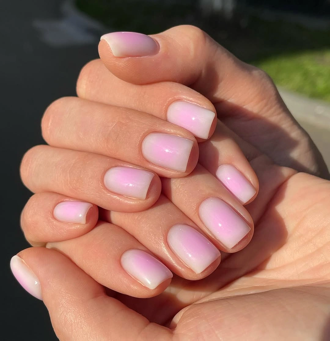 Elegant nude fall nails 2026 with soft pink glazed finish