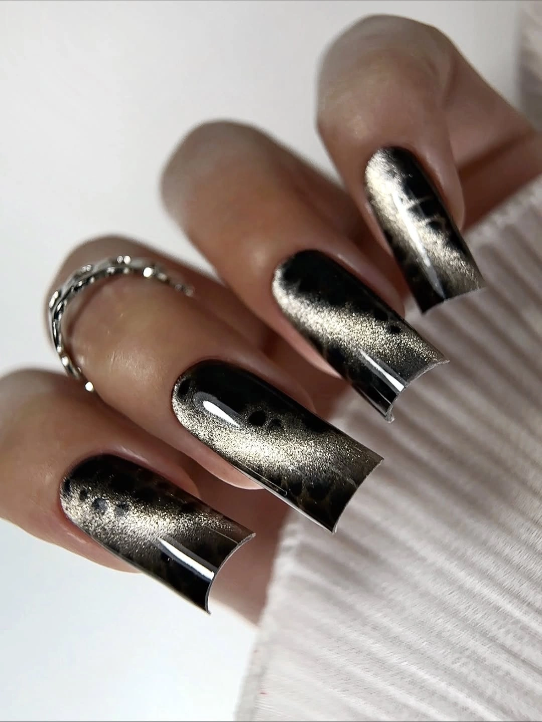gorgeous dark fall nails 2026 black chrome acrylic nails with a liquid metal finish