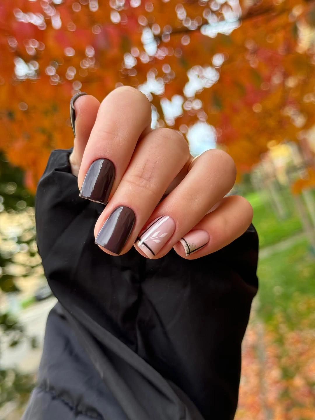 gorgeous dark fall nails 2026 - Dark Chocolate Nails With a Delicate Fall Accent