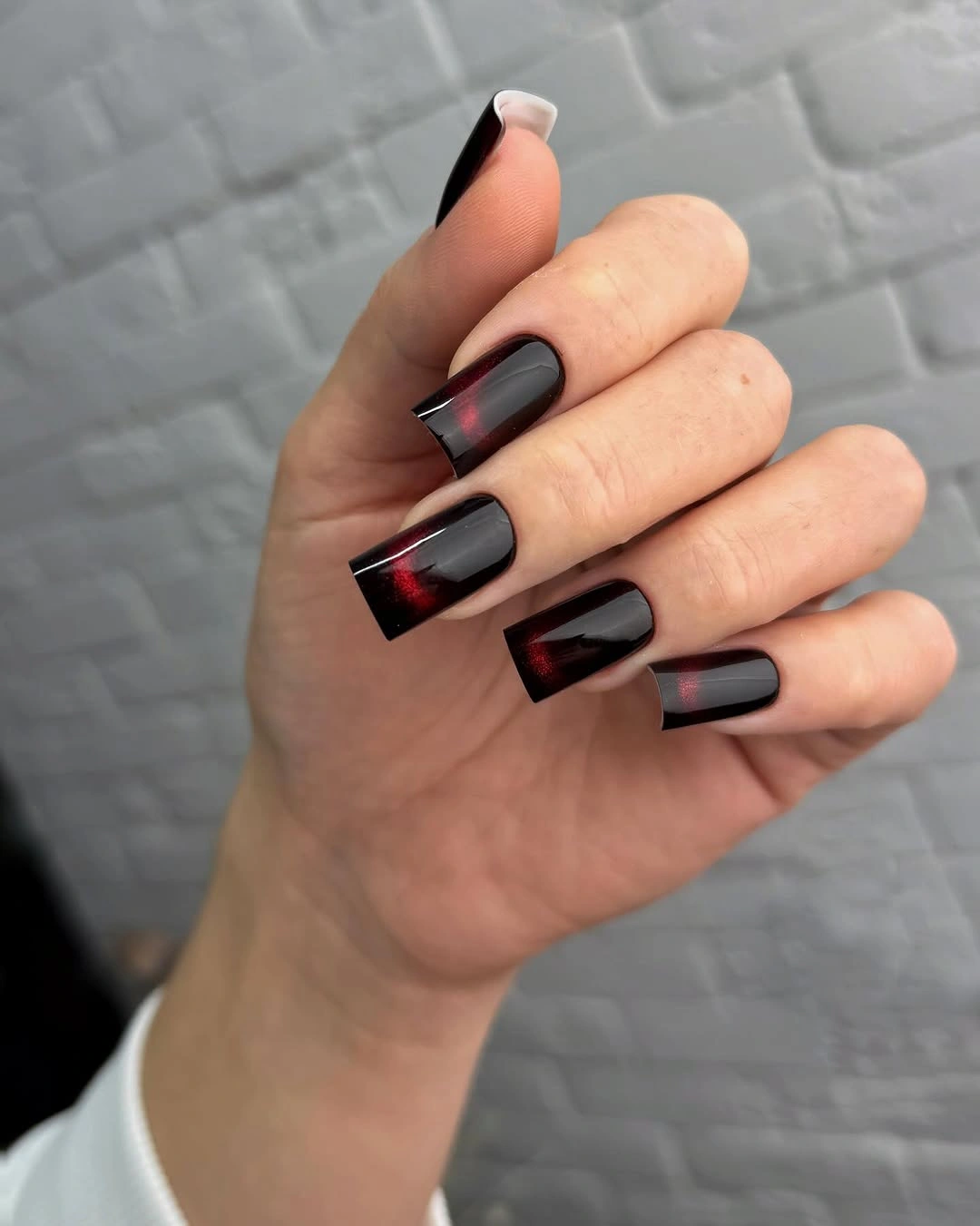 gorgeous dark fall nails 2026 - Black and Burgundy Magnetic Glow Nails