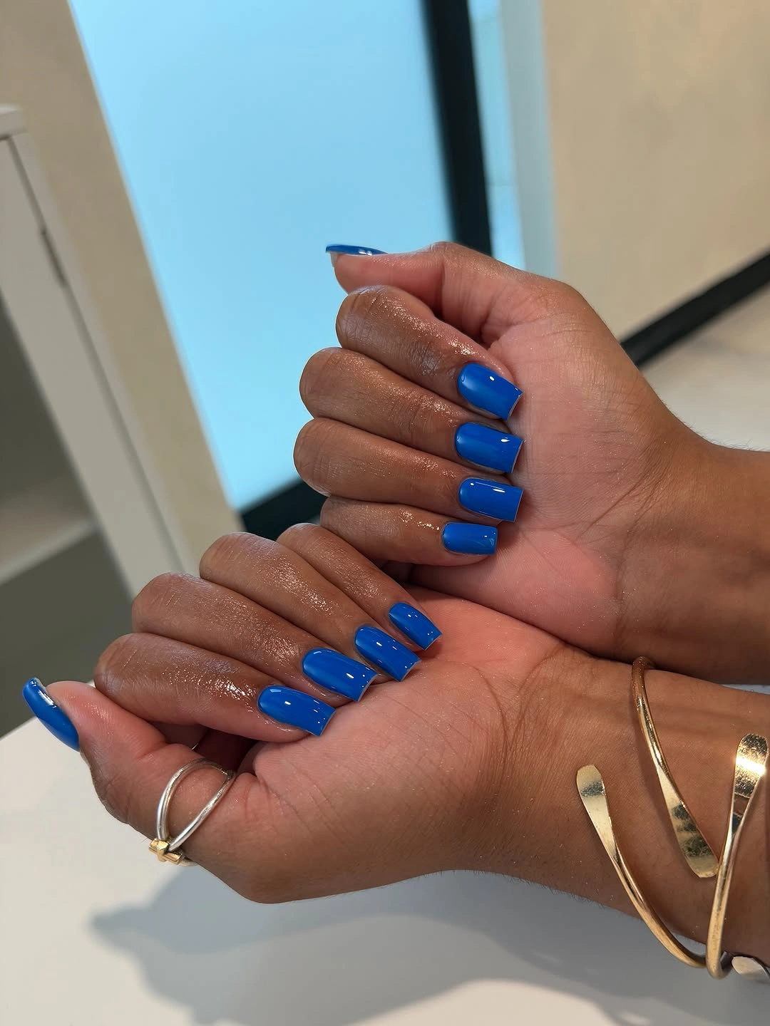 rich fall nails colors for dark skin Glossy Cobalt Blue for a Bright Fall Statement