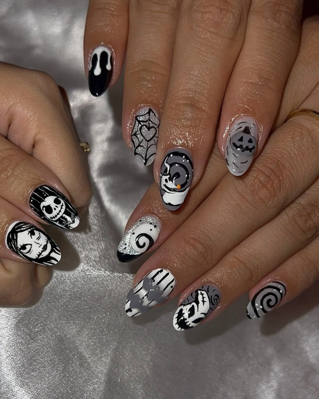 spooky halloween nails designs 2026 black white ghost skull Halloween manicure