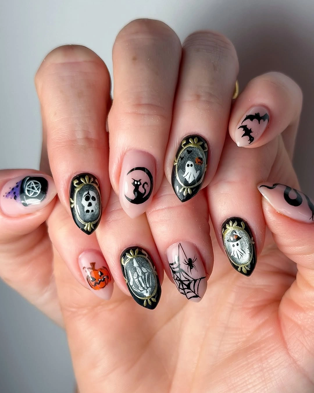 spooky halloween nails designs 2026 cute pink ghost skull Halloween manicure