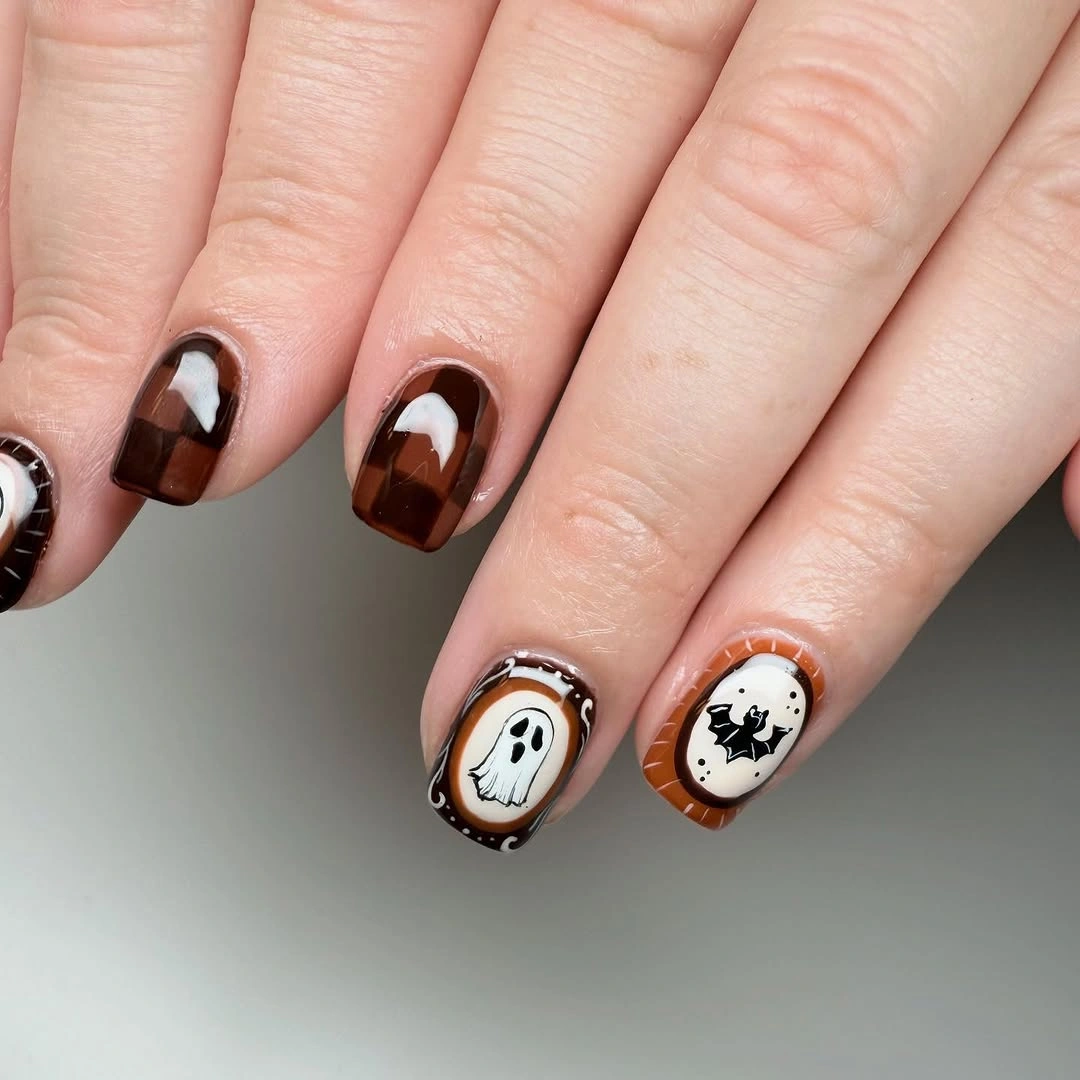 spooky halloween nails designs 2026 chocolate brown ghost Halloween manicure