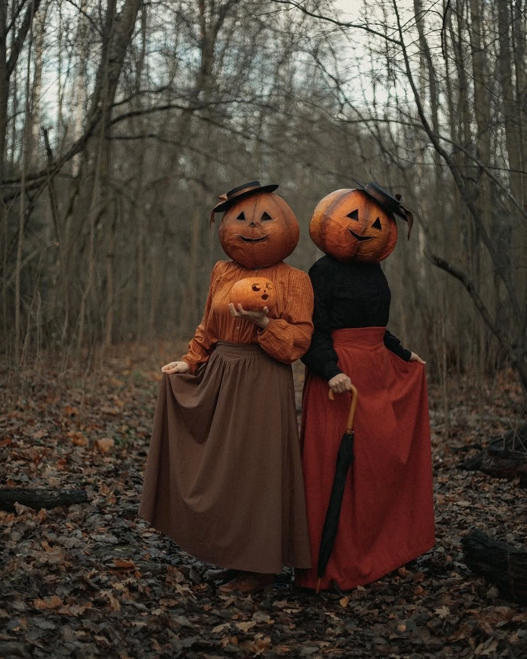 spooky halloween outfits 2026 - Pumpkin Duo in a Haunted Forest