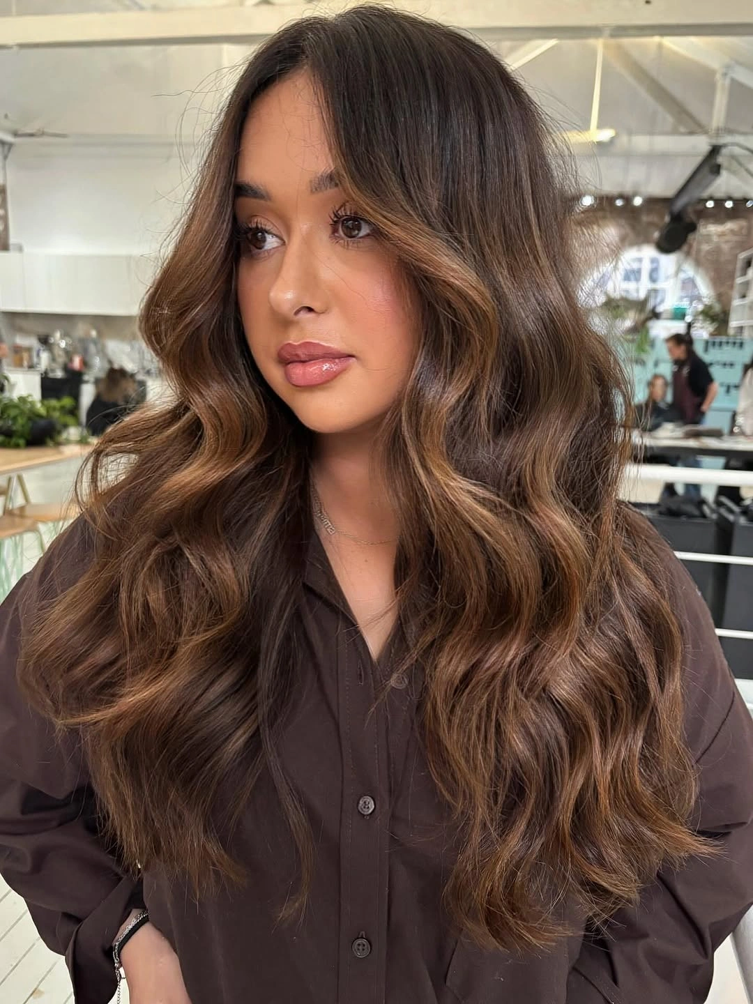 stunning fall brown hair colour ideas 2026 Caramel Melt Layers with Romantic Volume