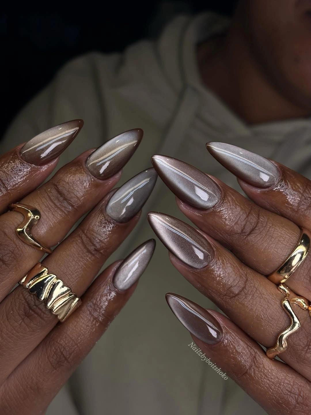 stunning fall nails for dark skin 2026 Smoky Taupe Chrome Almond Nails