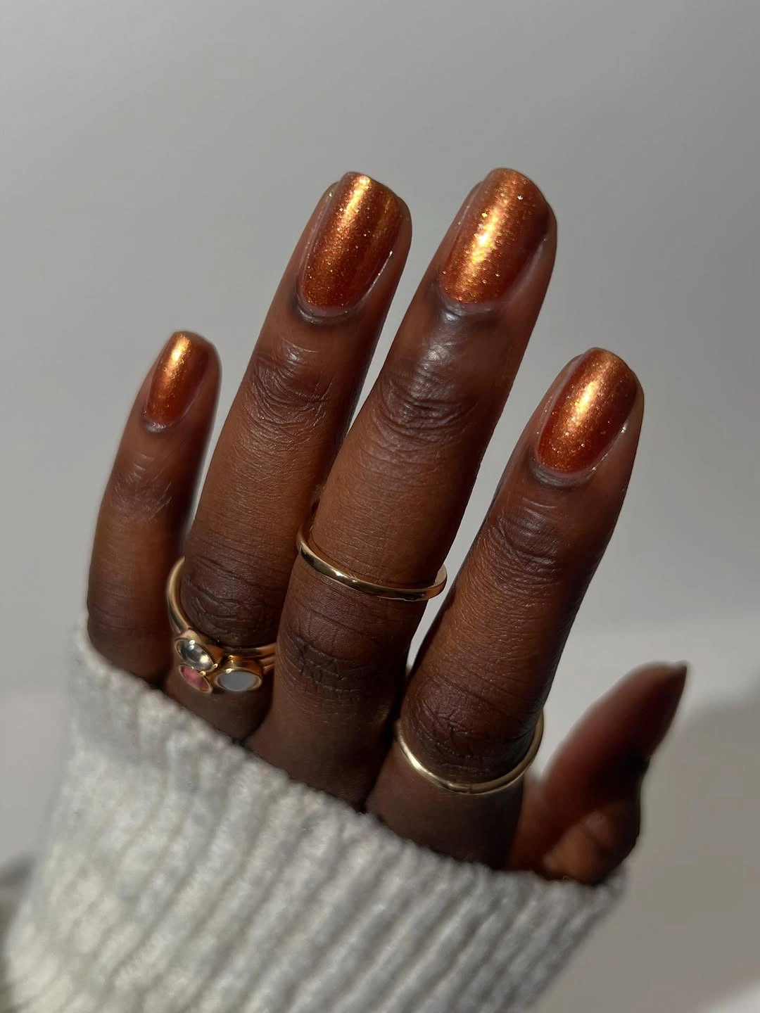 stunning fall nails for dark skin 2026 Burnished Copper Shimmer for Cozy Autumn Days