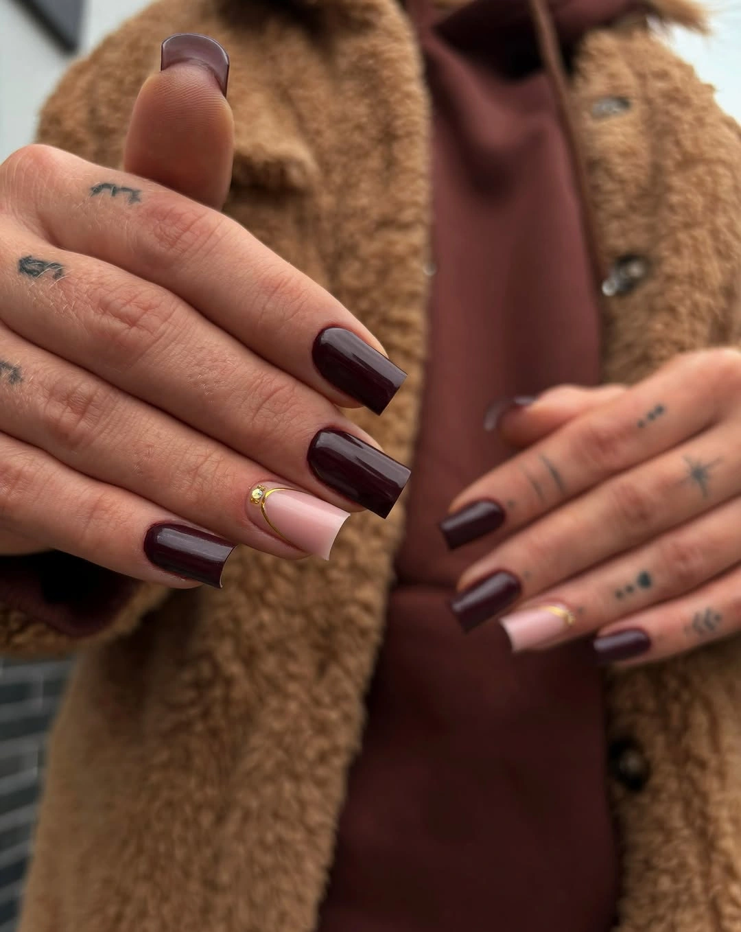 stylish autumn nails color - Dark burgundy manicure with a blush accent