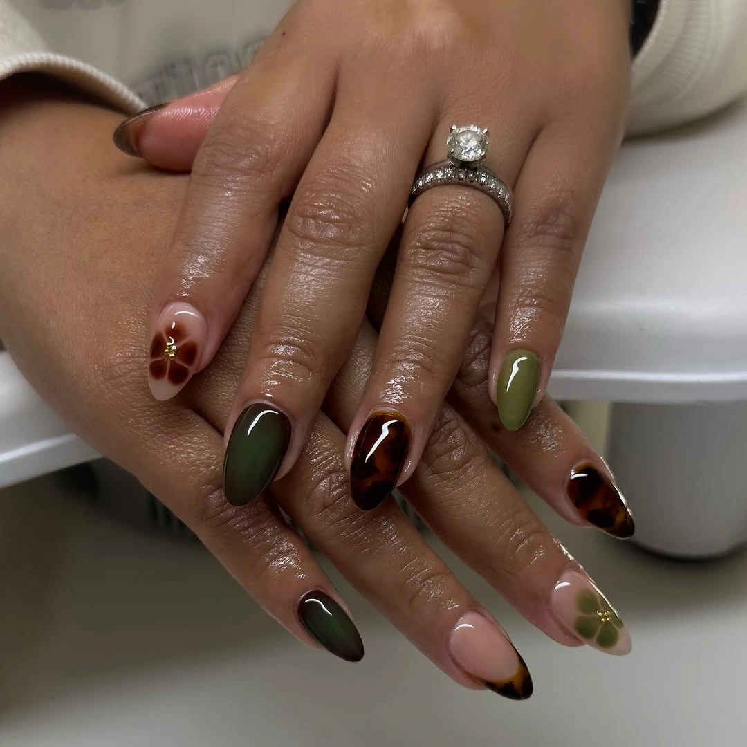 stylish fall nail trends 2026 Olive Green and Tortoiseshell Almond Nails