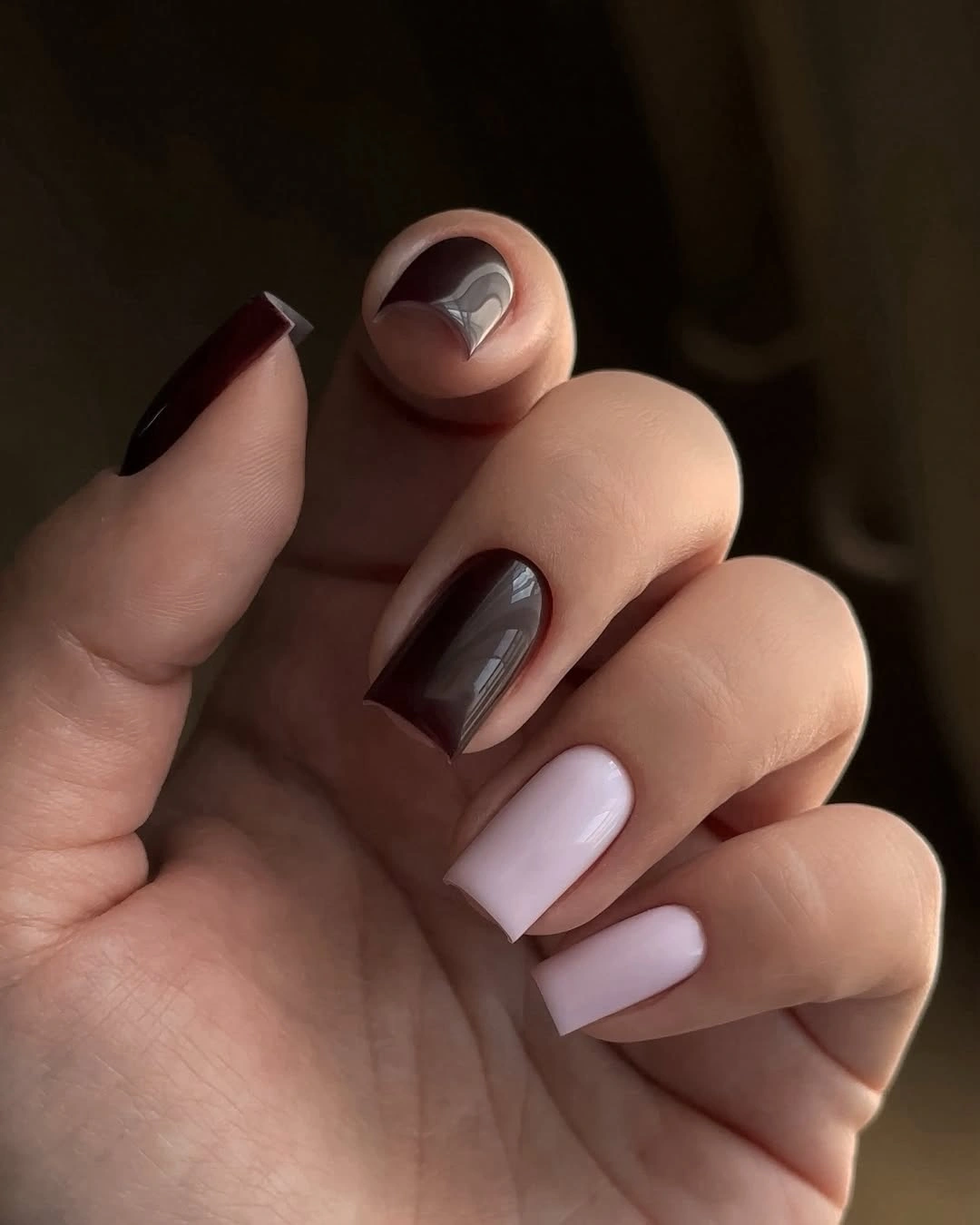 stylish fall nails for fair skin tones 2026 Deep Burgundy and Silver Heart Details
