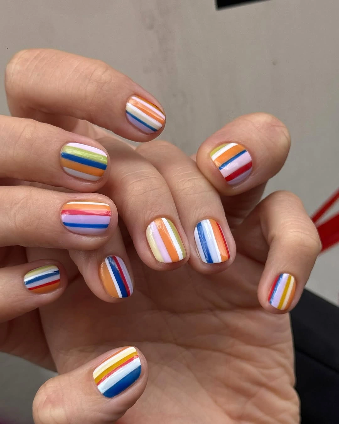 stylish fall nails for tan skin tone Playful Multicolor Stripe Nails