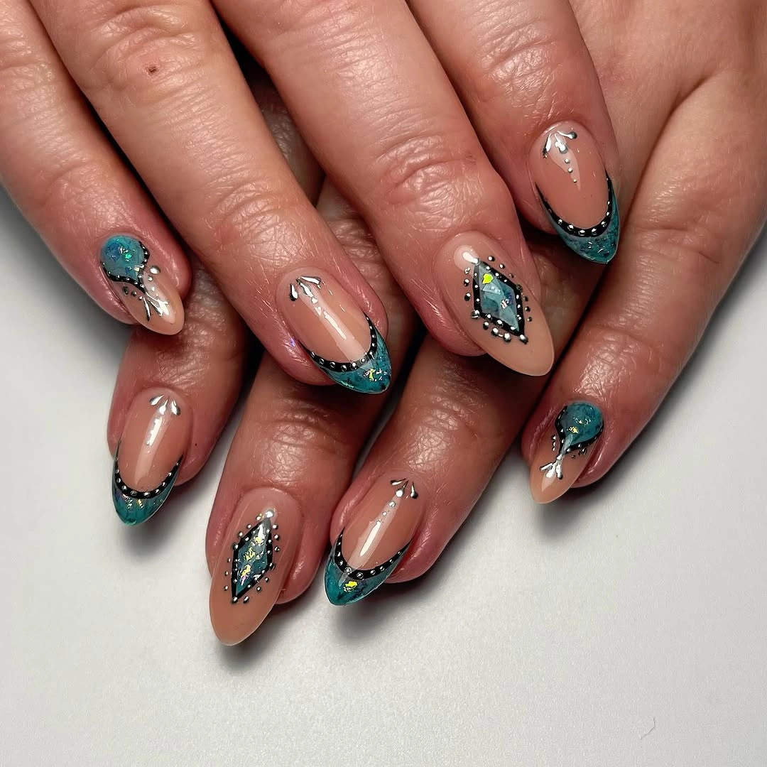 stylish fall nails with accent nail - Teal Chrome French Tips and Crystal Accents