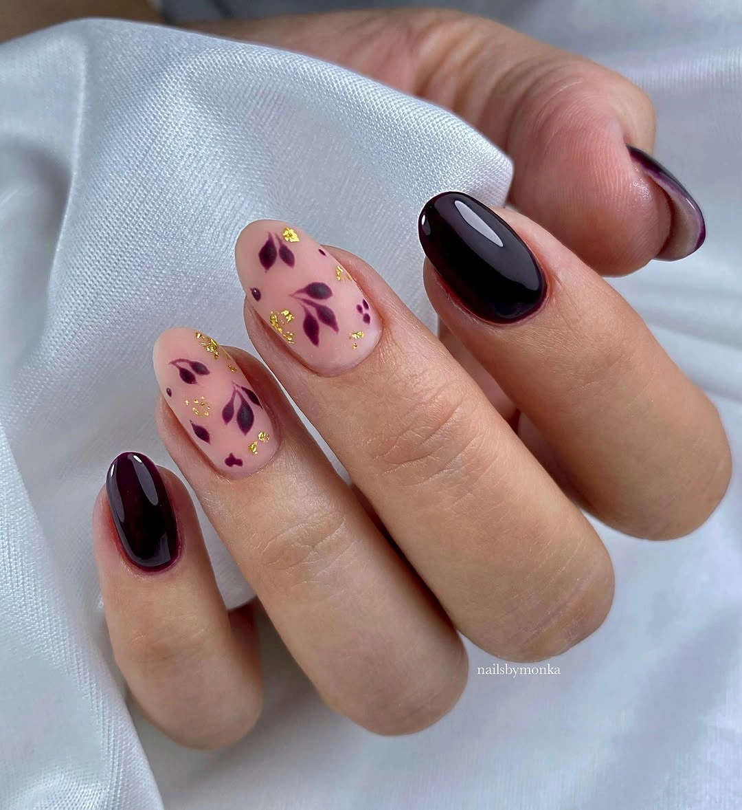 stylish fall red nails 2026 Burgundy Botanical Nails With Delicate Gold Accents