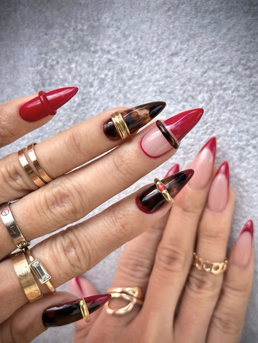 stylish fall red nails 2026 Modern Burgundy French Tips With Luxe Tortoiseshell Details