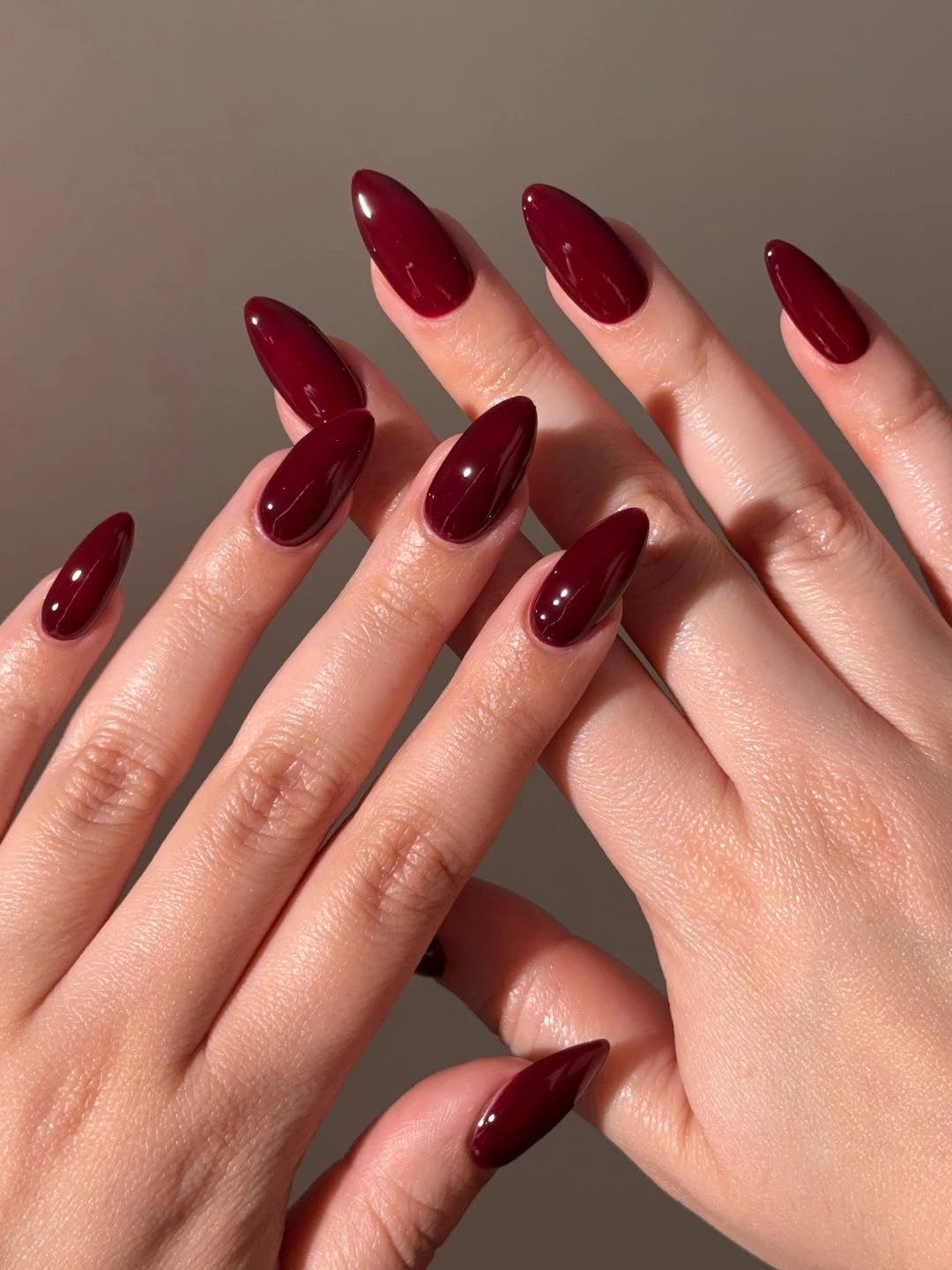 stylish fall red nails 2026 Classic Dark Cherry Almond Nails