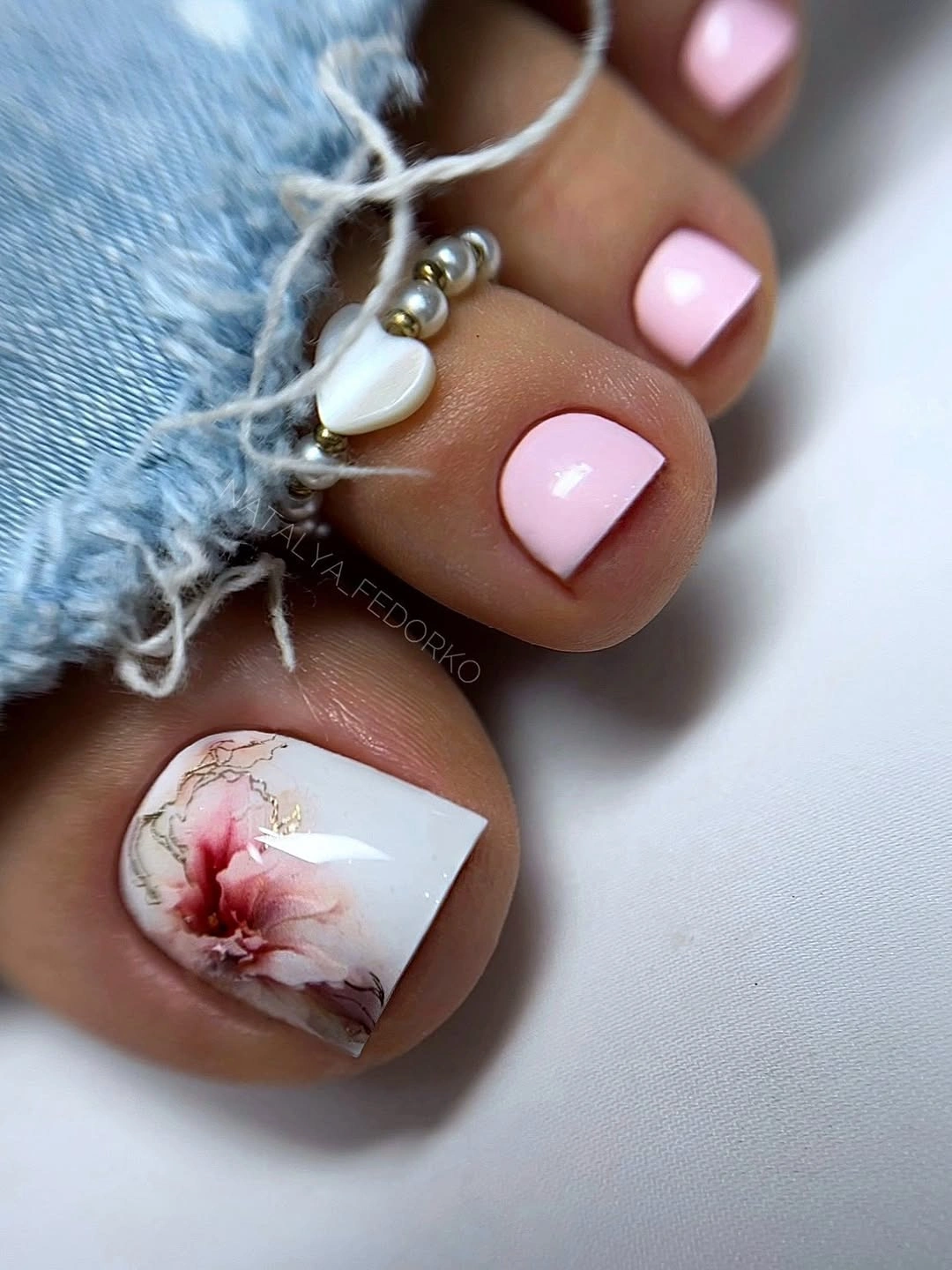 stylish fall toe nails colors 2026 - Blush Pink Pedicure With a Floral Accent
