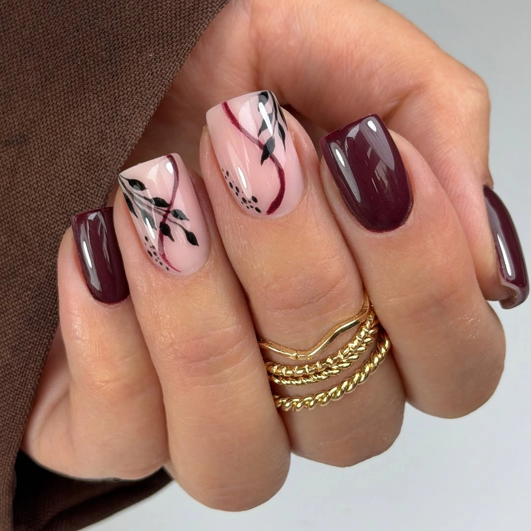 stylish maroon fall nails 2026 Maroon Nails With Abstract Leaf Details