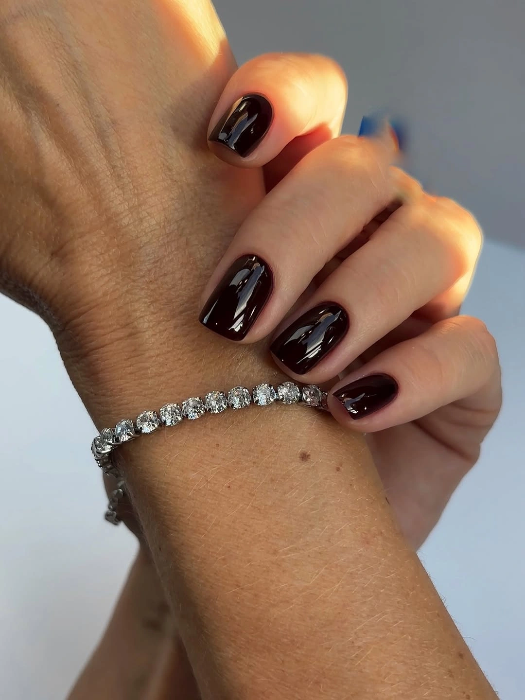 stylish maroon fall nails 2026 Short Dark Burgundy Nails With A High-Shine Finish