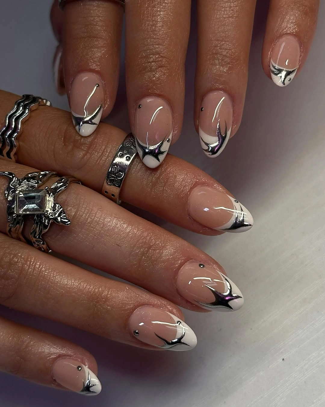 stylish simple fall short nails Soft Chrome Almond Nails With a Silver French Twist
