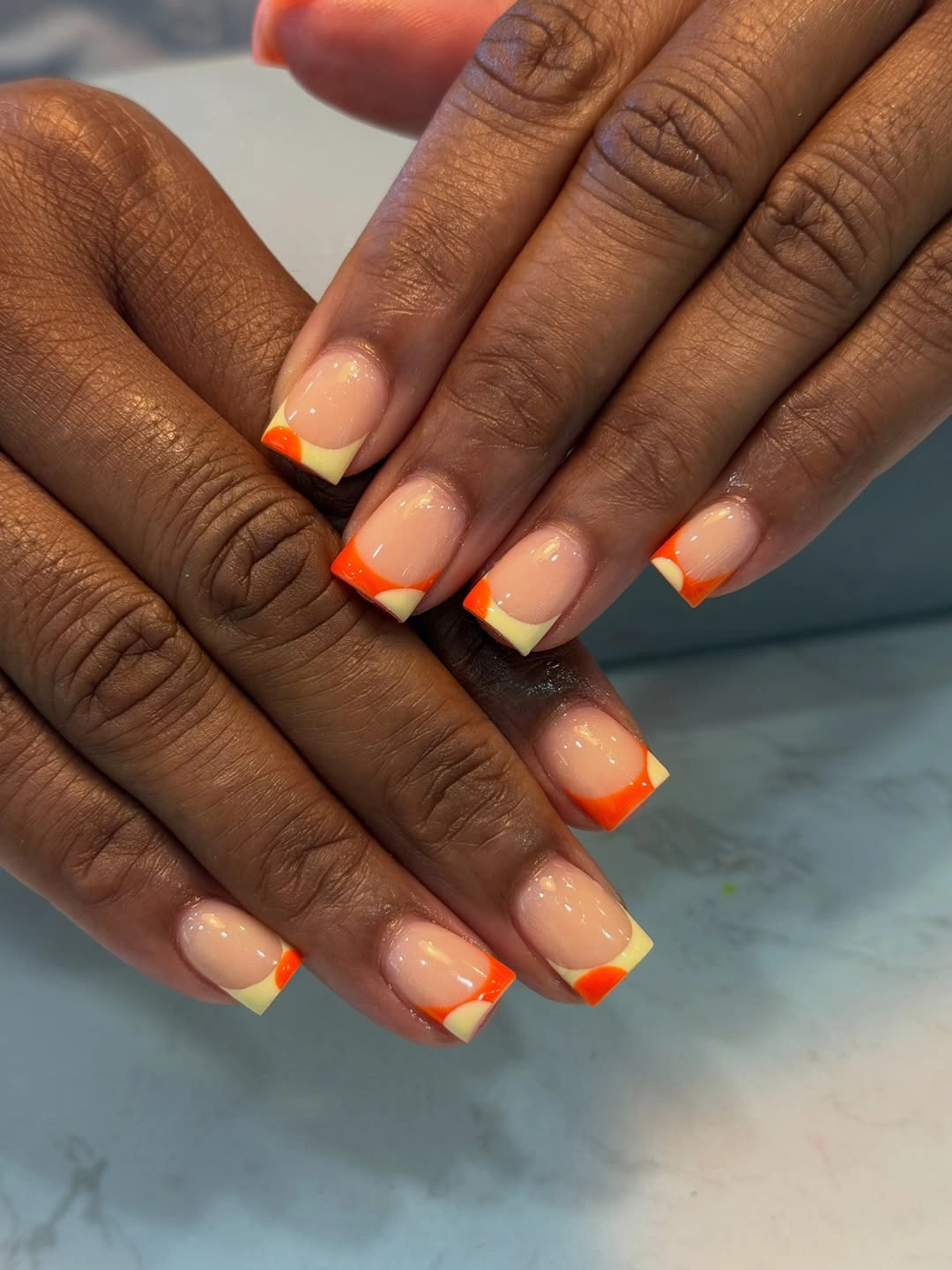 stylish simple fall short nails - Bright Orange French Tips with a Fall Twist