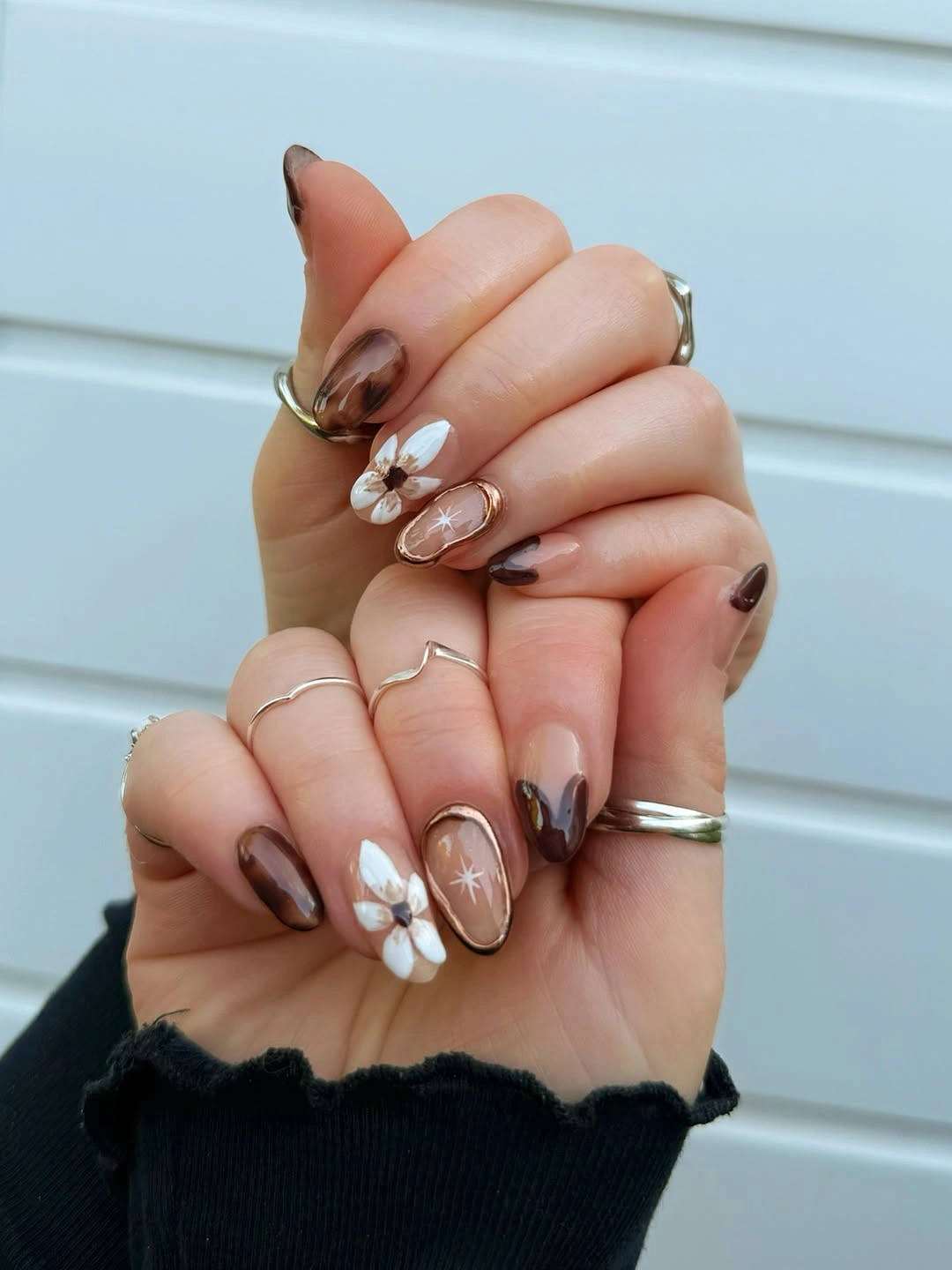 trendy brown fall nails 2026 Soft Brown Floral Almond Nails
