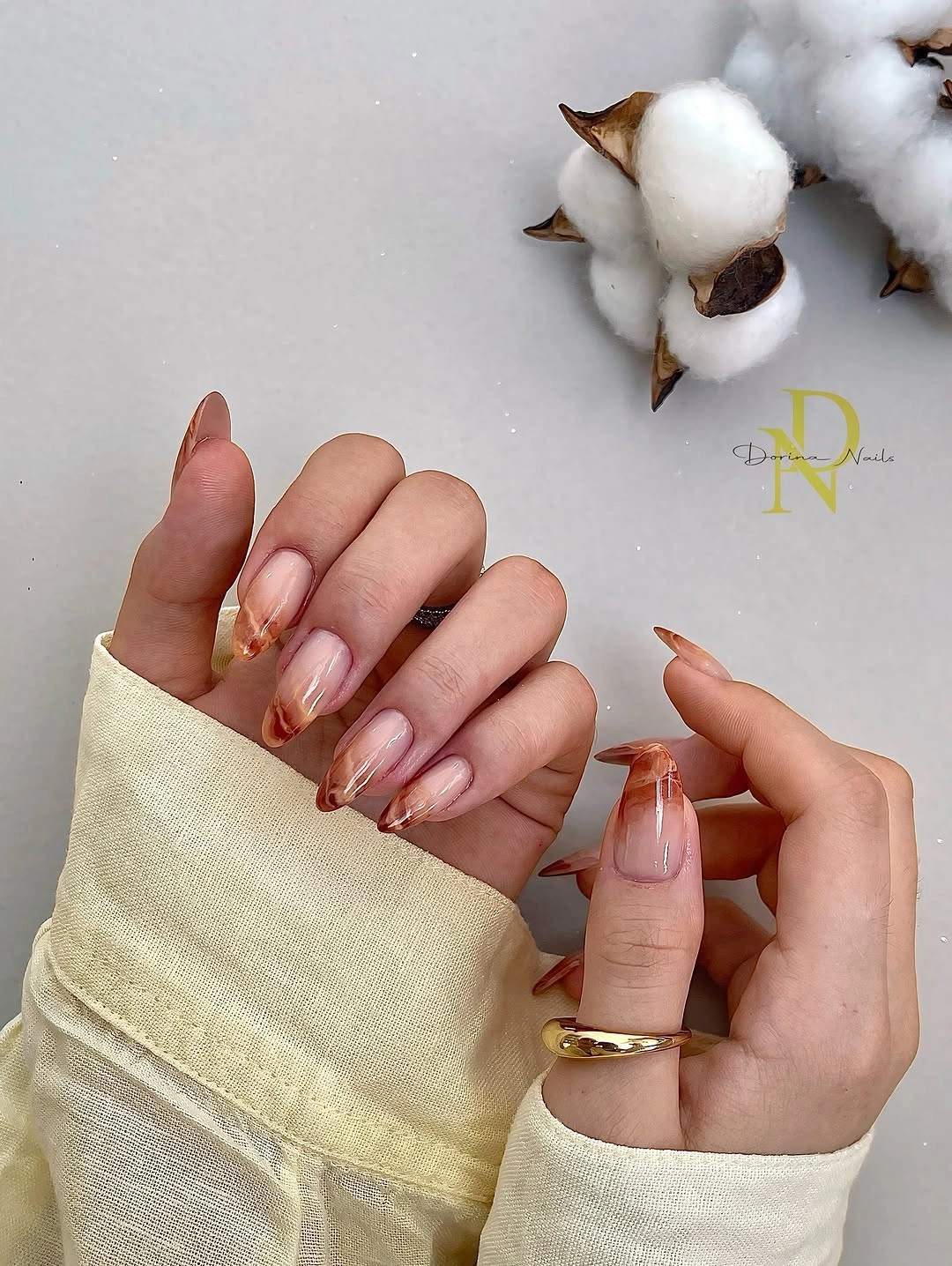 trendy fall acrylic nails 2026 Warm Amber Marble French Tips For Long Almond Acrylics