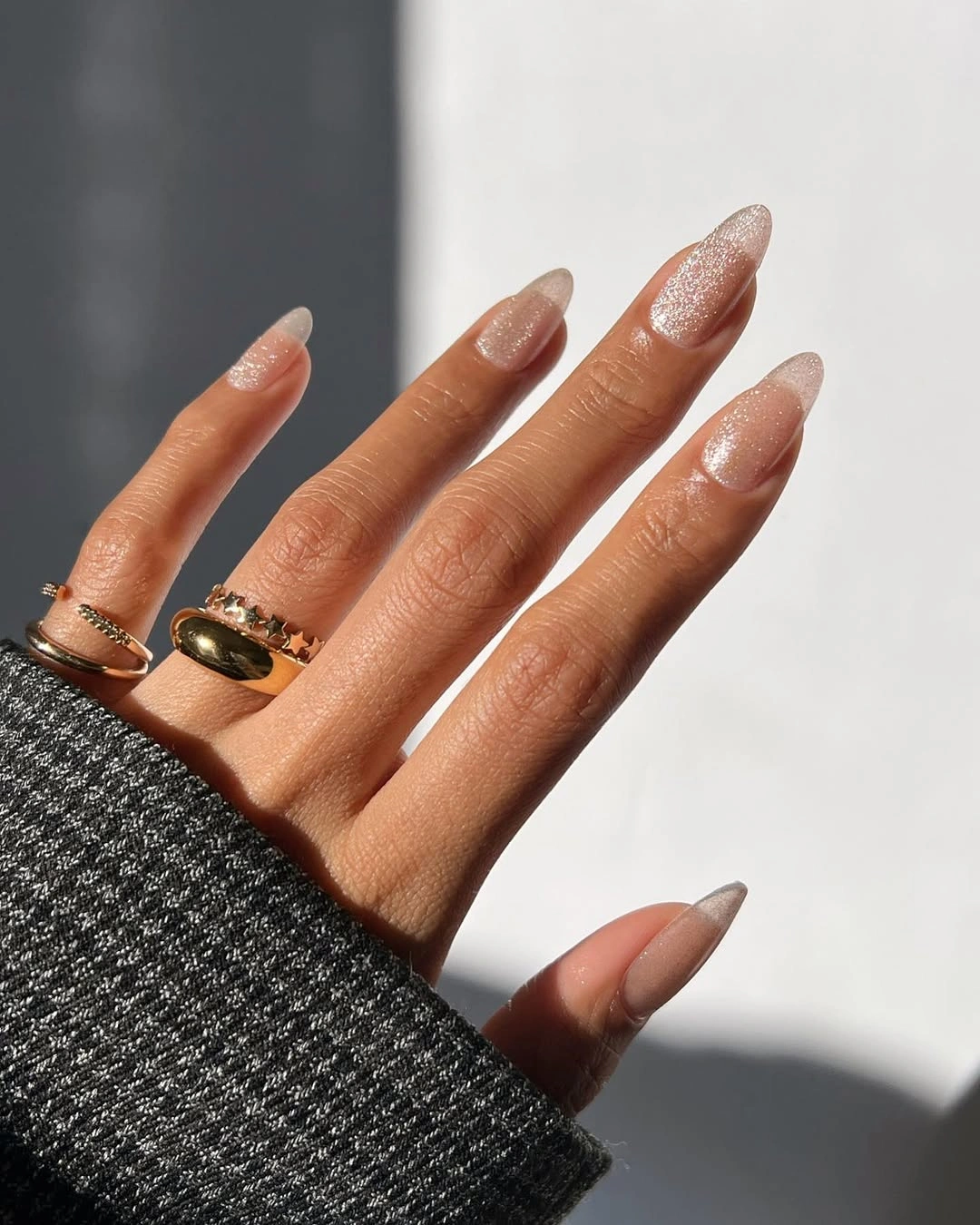 trendy fall dip nails 2026 sheer nude champagne glitter almond manicure