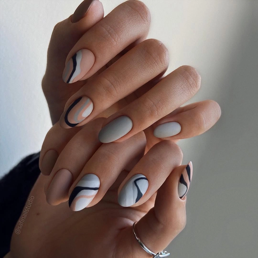 trendy fall dip nails 2026 milky white navy abstract short manicure