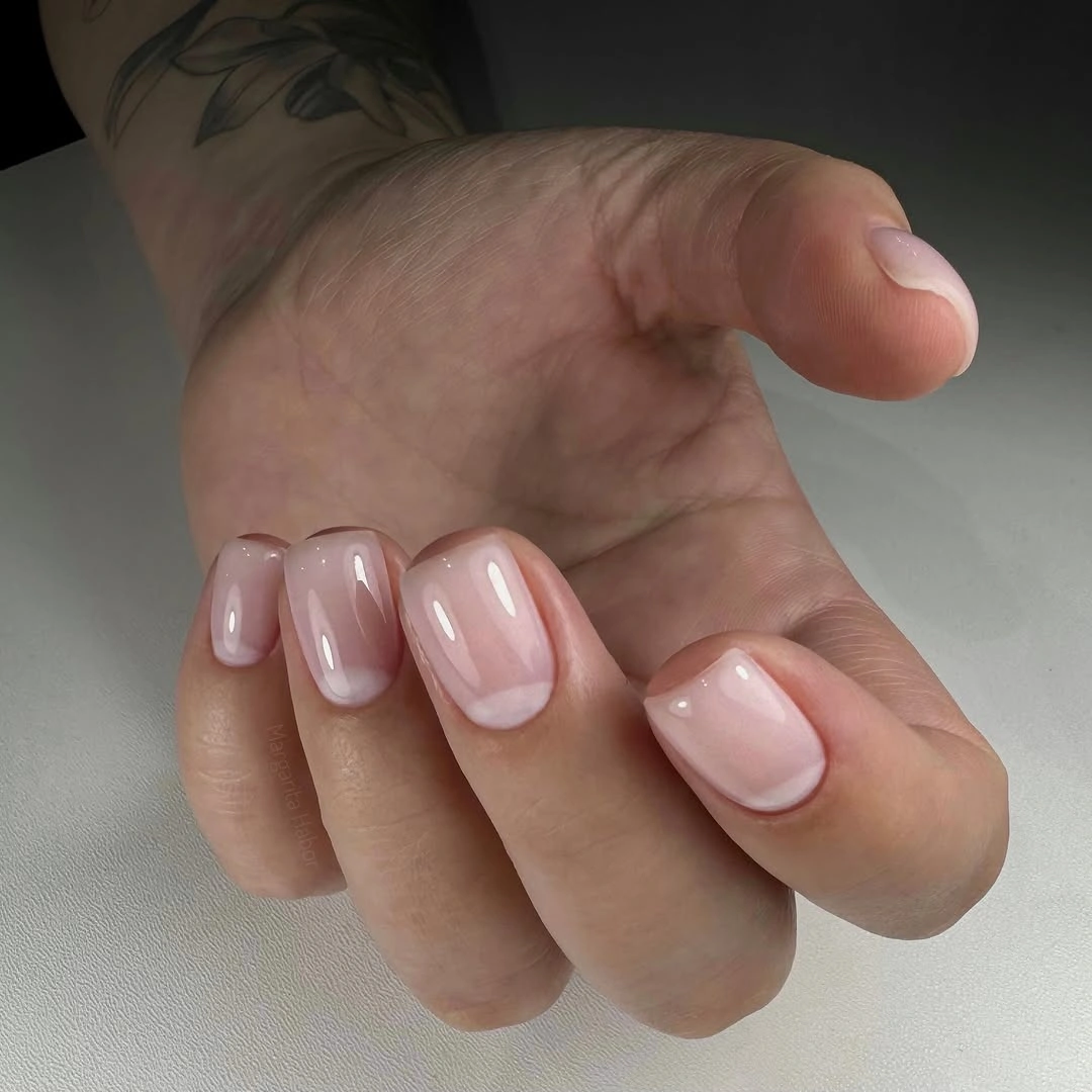 trendy fall nails for fair skin tone - short milky pink nails with soft white tips