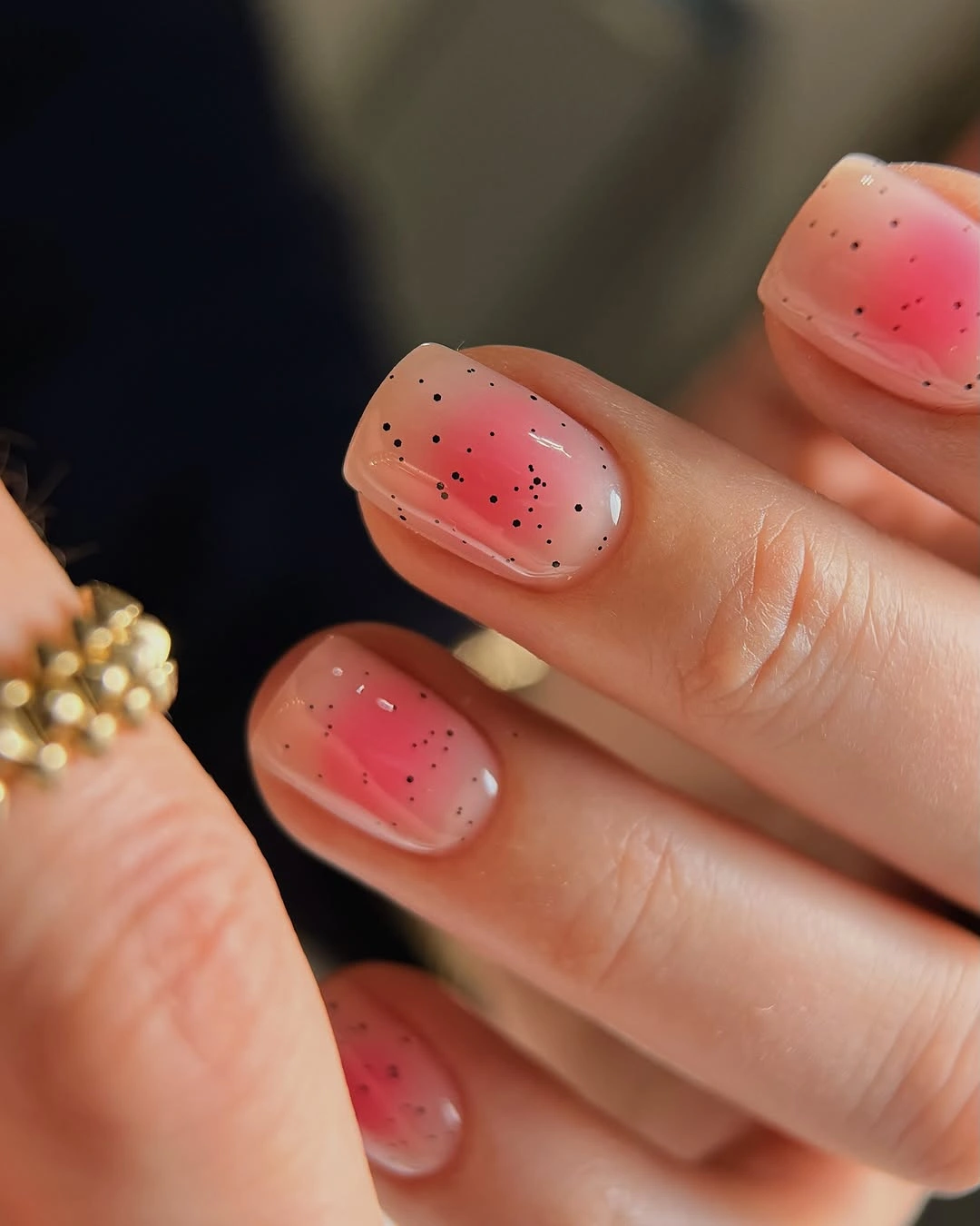 trendy fall nails for fair skin tone - blush jelly nails with black speckles
