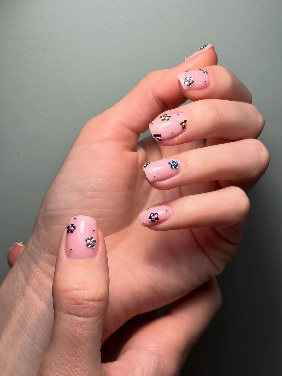 trendy fall nails for fair skin tone - blush pink nails with rhinestone flowers
