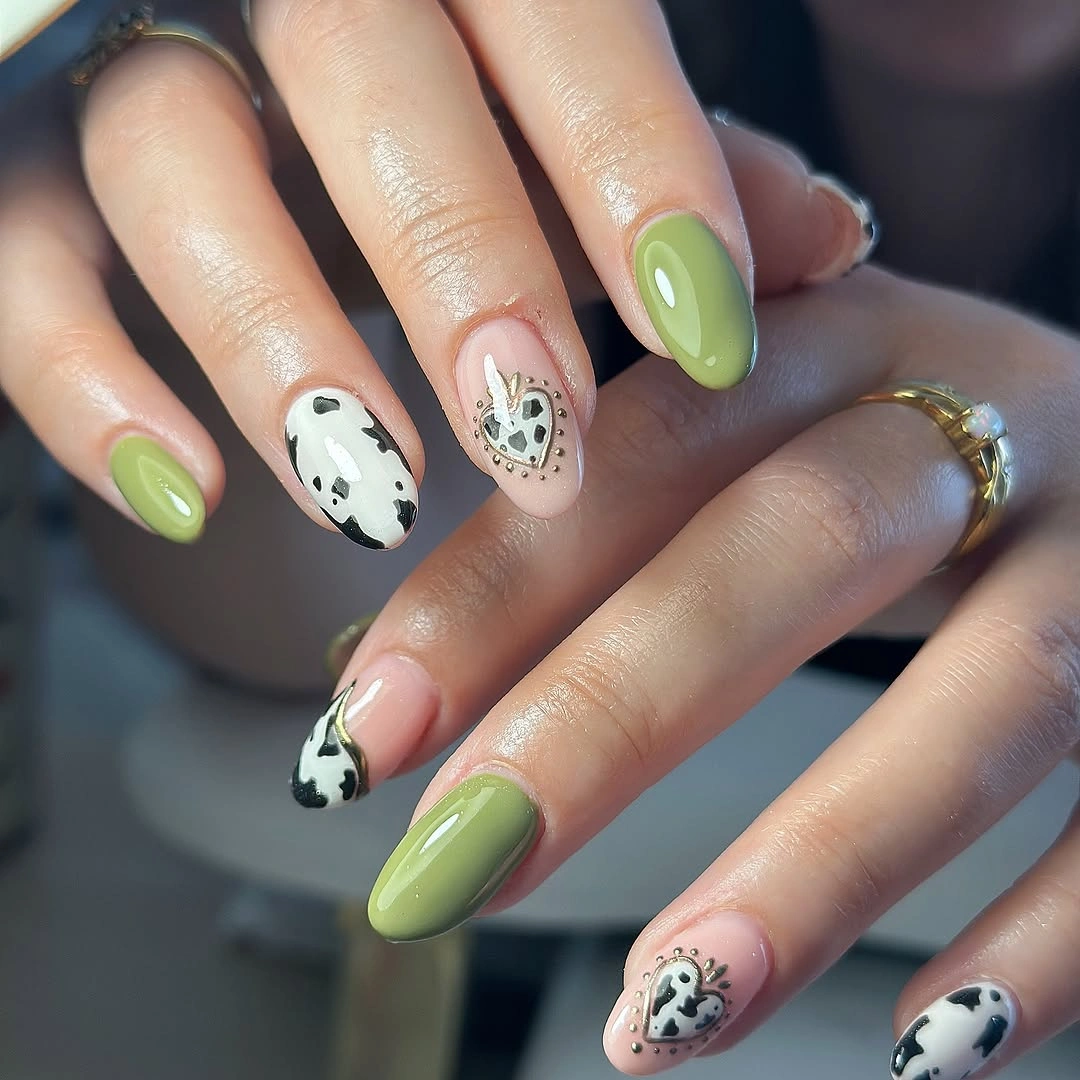trendy fall nails for olive skin tone 2026 olive green cow print manicure