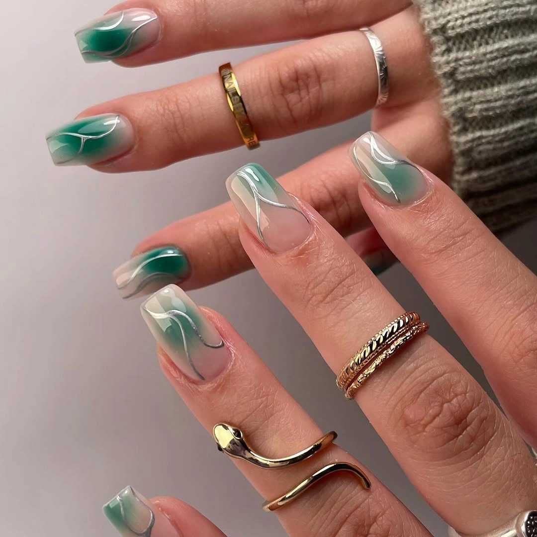 Trendy fall short coffin nails designs Emerald Green Swirls With a Glassy Finish