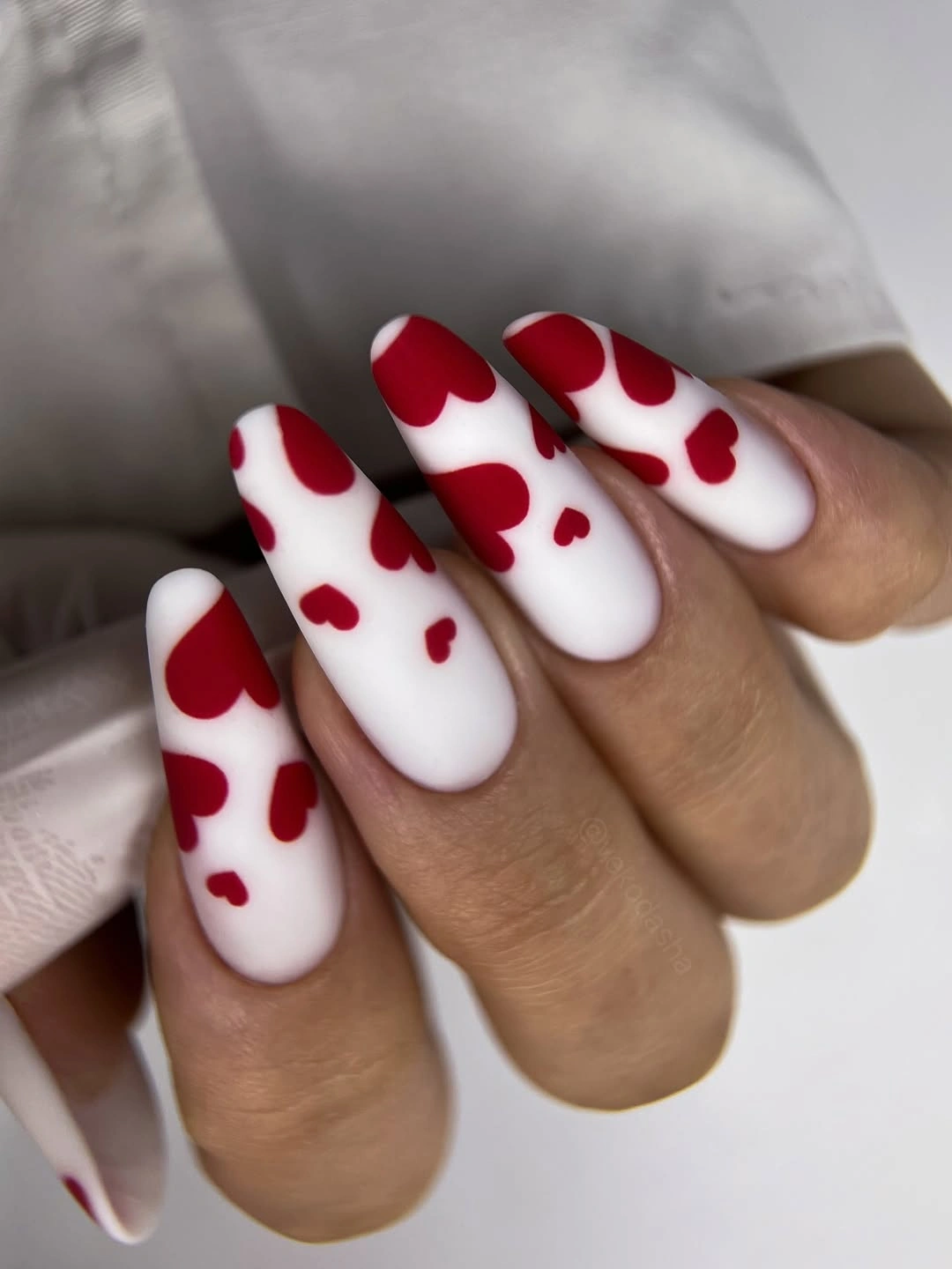 trendy matte fall nails design 2026 Matte Milky White Nails With Burgundy Hearts