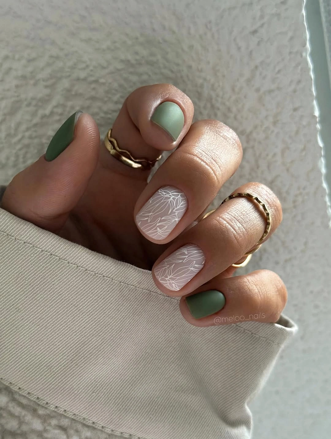 trendy matte fall nails design 2026 Muted Green Nails With Fine White Botanical Art