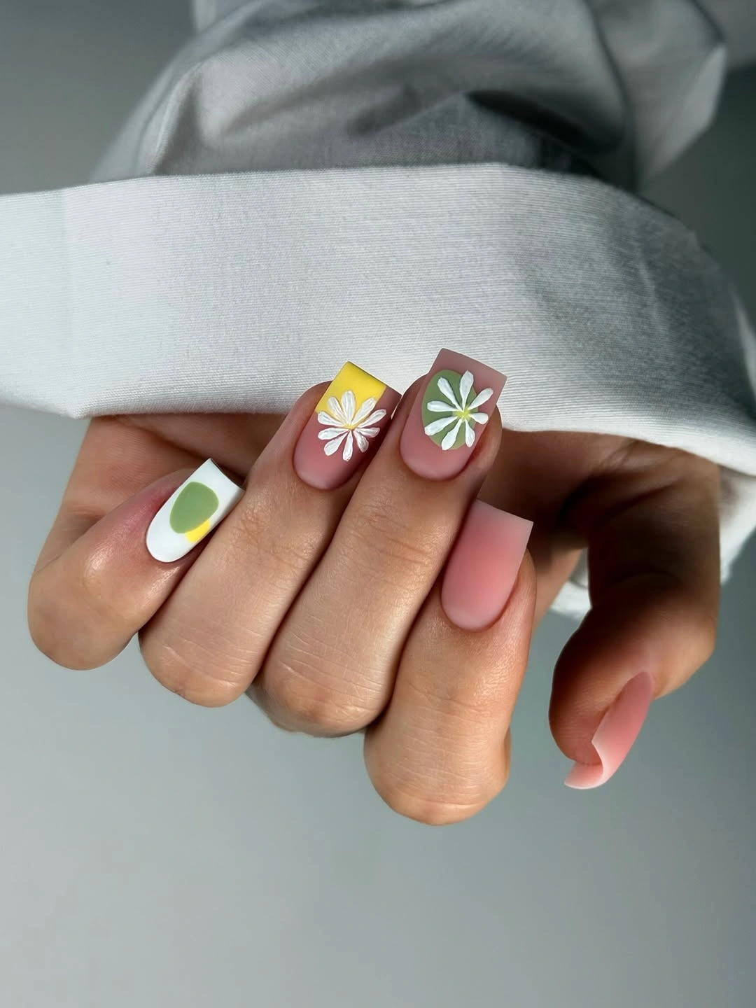 trendy matte fall nails design 2026 Soft Pink Matte Nails With Playful Autumn Flowers