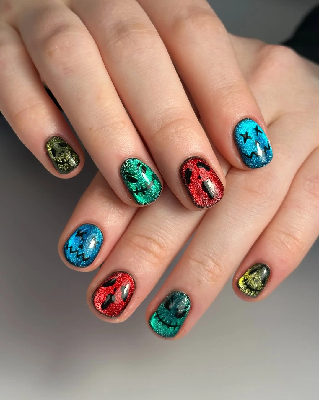 unique halloween nail art 2026 Jewel Tone Jack O Lantern Nails