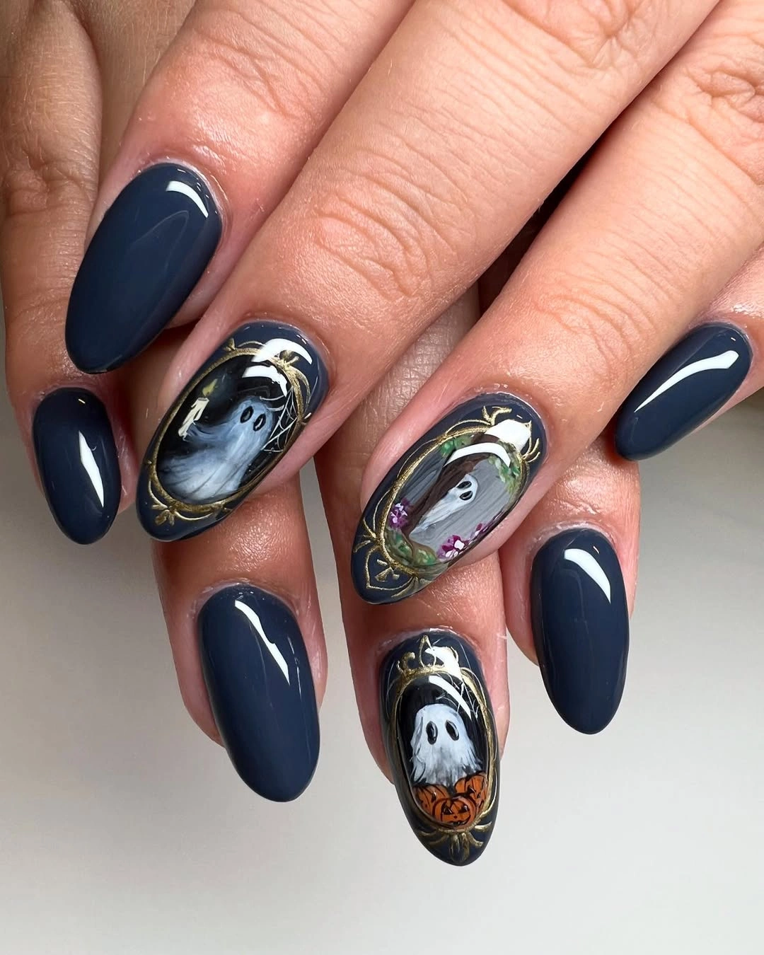 unique halloween nail art 2026 Midnight Navy Ghosts With Antique Gold Details